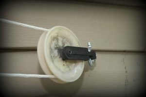 How to Install a Clothesline - Clothesline pulley