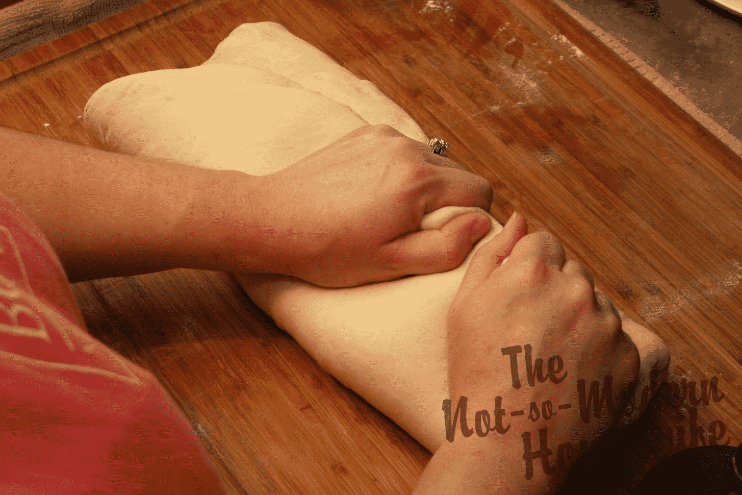 Italian Sun-dried Tomato Ciabatta | The Not So Modern Housewife shaping ciabatta bread