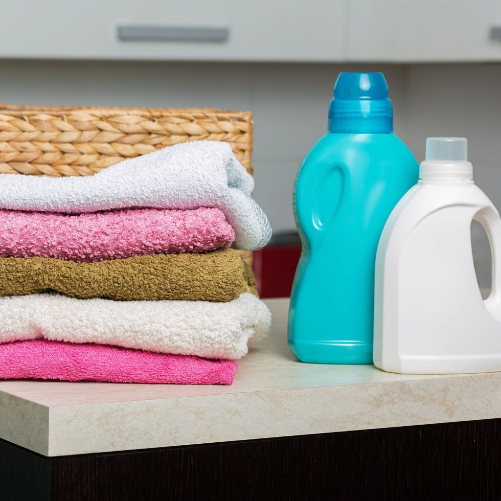 commercial laundry detergent with clean towels