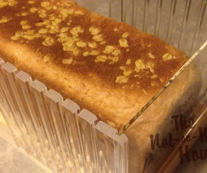 Honey Oat Bread in bread slicer