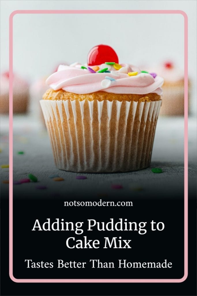 decorated vanilla cupcake with pink icing, cherry, and sprinkles - adding pudding to cake mix to make it taste better than homemade