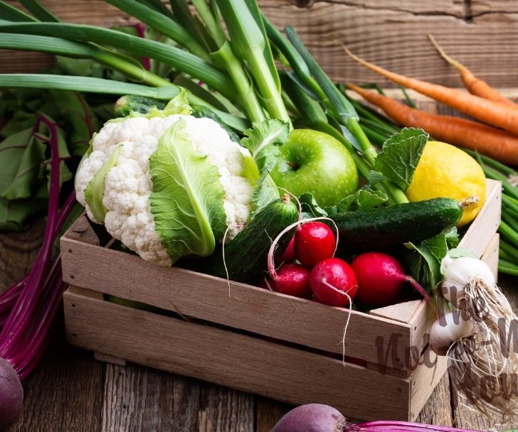 Wooden rustic box of fruits and vegetables