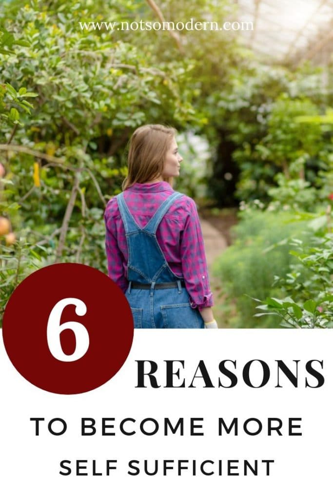 woman standing in garden - 6 Reasons to Become More Self-Sufficient