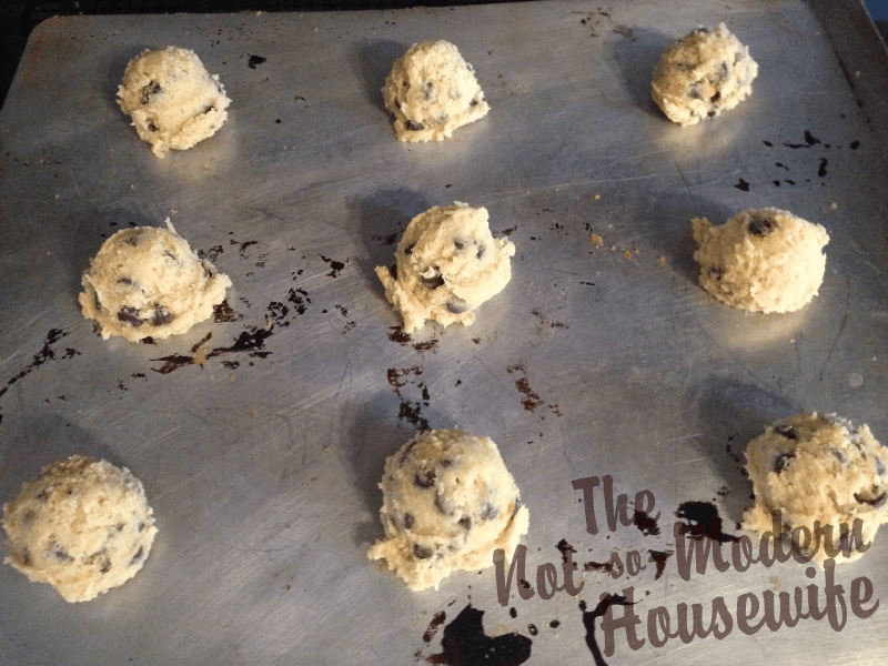 I use a medium sized ice cream scoop to dish out my cookie dough. It gives the cookies a nice shape and portions them perfectly. - The Not So Modern Housewife