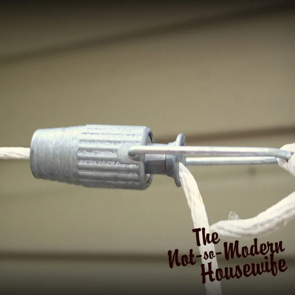 7 Easy Steps to Install a Clothesline with Pulleys | The Not so Modern Housewife clothesline tensioner for pulley clothesline