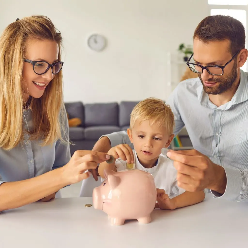 parents teaching son about saving and investing
