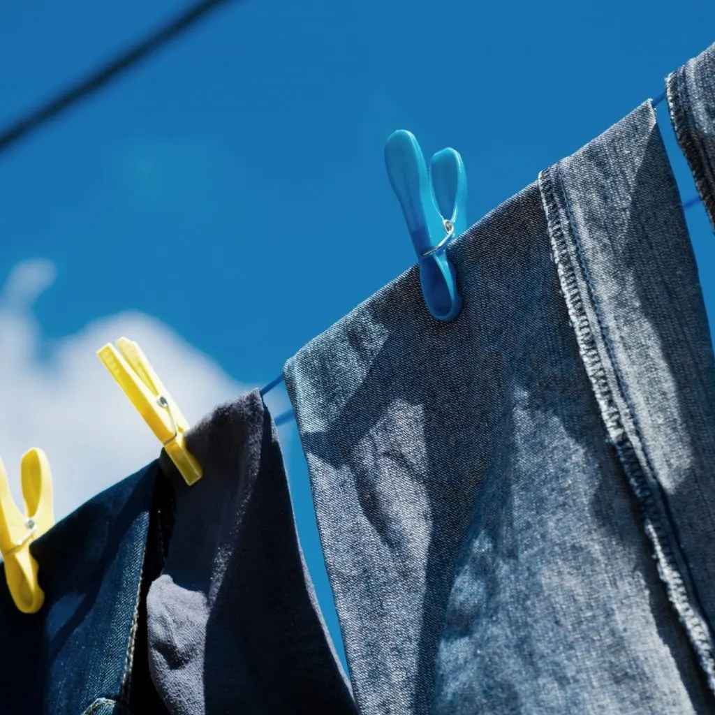 DIY Homemade Laundry Detergent without Borax: Save Money and Protect Your Family | The Not so Modern Housewife jeans on clothesline - Dry Laundry on the Clothesline