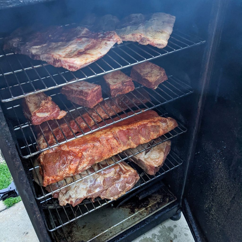 Ribs in smoker - pineapple glazed pork ribs