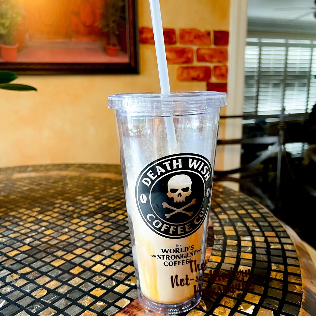 Vanilla caramel iced latte made with vanilla coffee from Death Wish Coffee Co. Served in Death Wish Coffee Iced Coffee Tumbler
